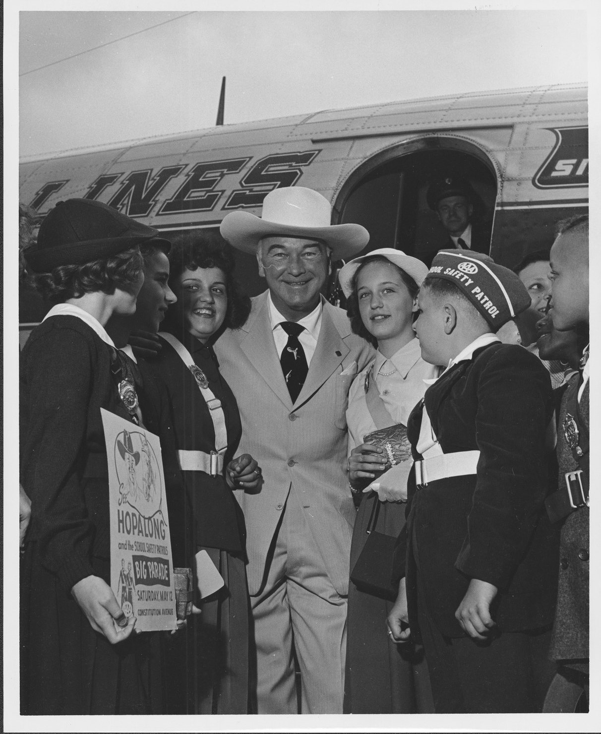 William Boyd posing with group of children from AAA School Safety ...